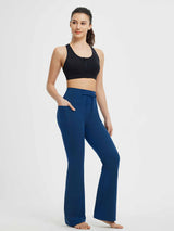 Blue flare yoga pants for women, high-waist with drawstring and functional pockets. #Color_Navy Blue