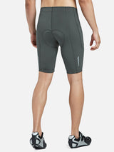 Back view of men's UPF 50+ cycling shorts in dark grey with padded seat, side pockets, and reflective strips.