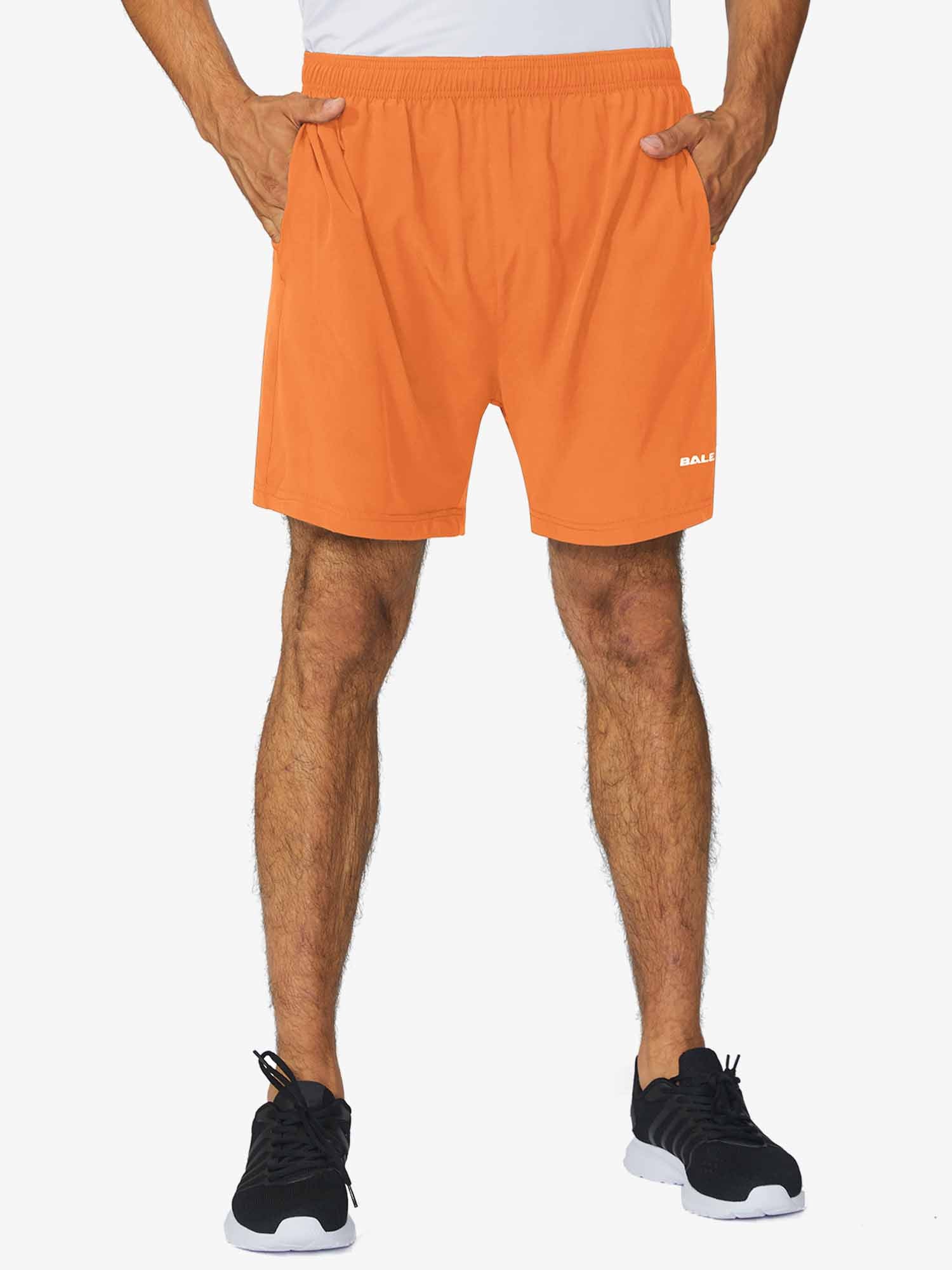 Men's orange 5" running shorts by BALE, with elastic waist and pockets. #color_Bright Orange