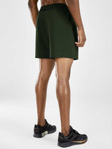 Men's 5" running shorts in dark green, featuring a back zip pocket. #color_Army Green