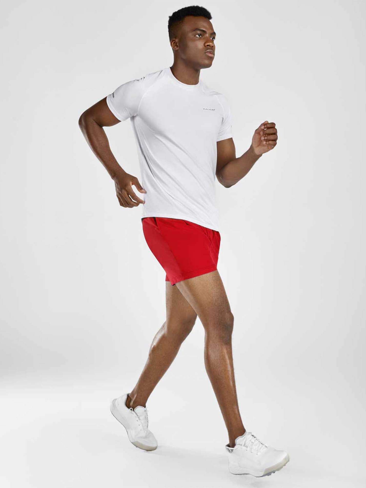 Red men's 5-inch running shorts with white athletic t-shirt #color_Red