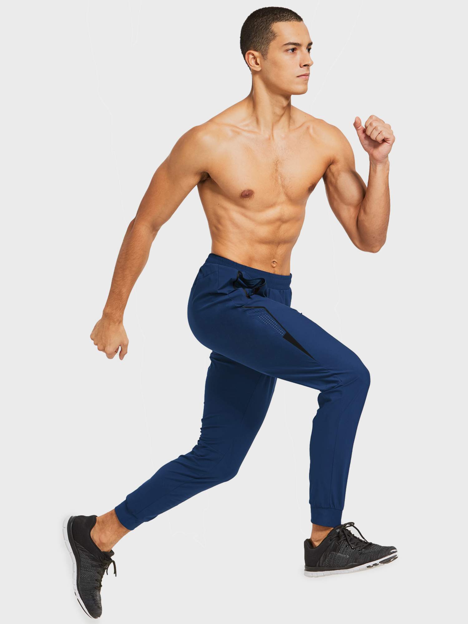 Men's navy lightweight running joggers with zip pockets & tapered cuffs. Moisture-wicking fabric. #color_Navy Blue