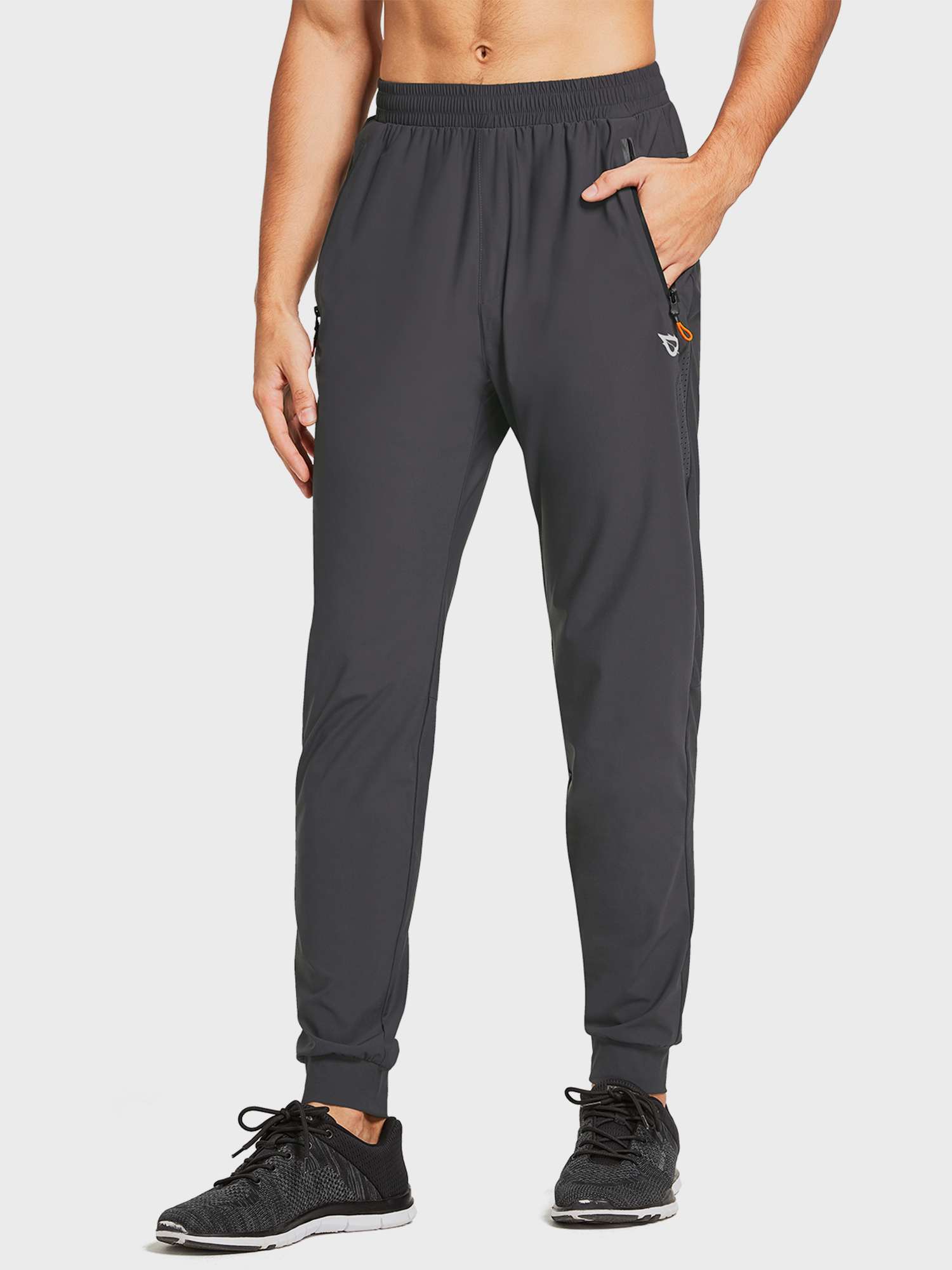 Men's dark grey lightweight jogger pants featuring zippered pockets, mesh panels, and elastic cuffs. #color_Dark Gray