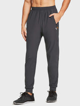 Men's dark grey lightweight jogger pants featuring zippered pockets, mesh panels, and elastic cuffs. #color_Dark Gray