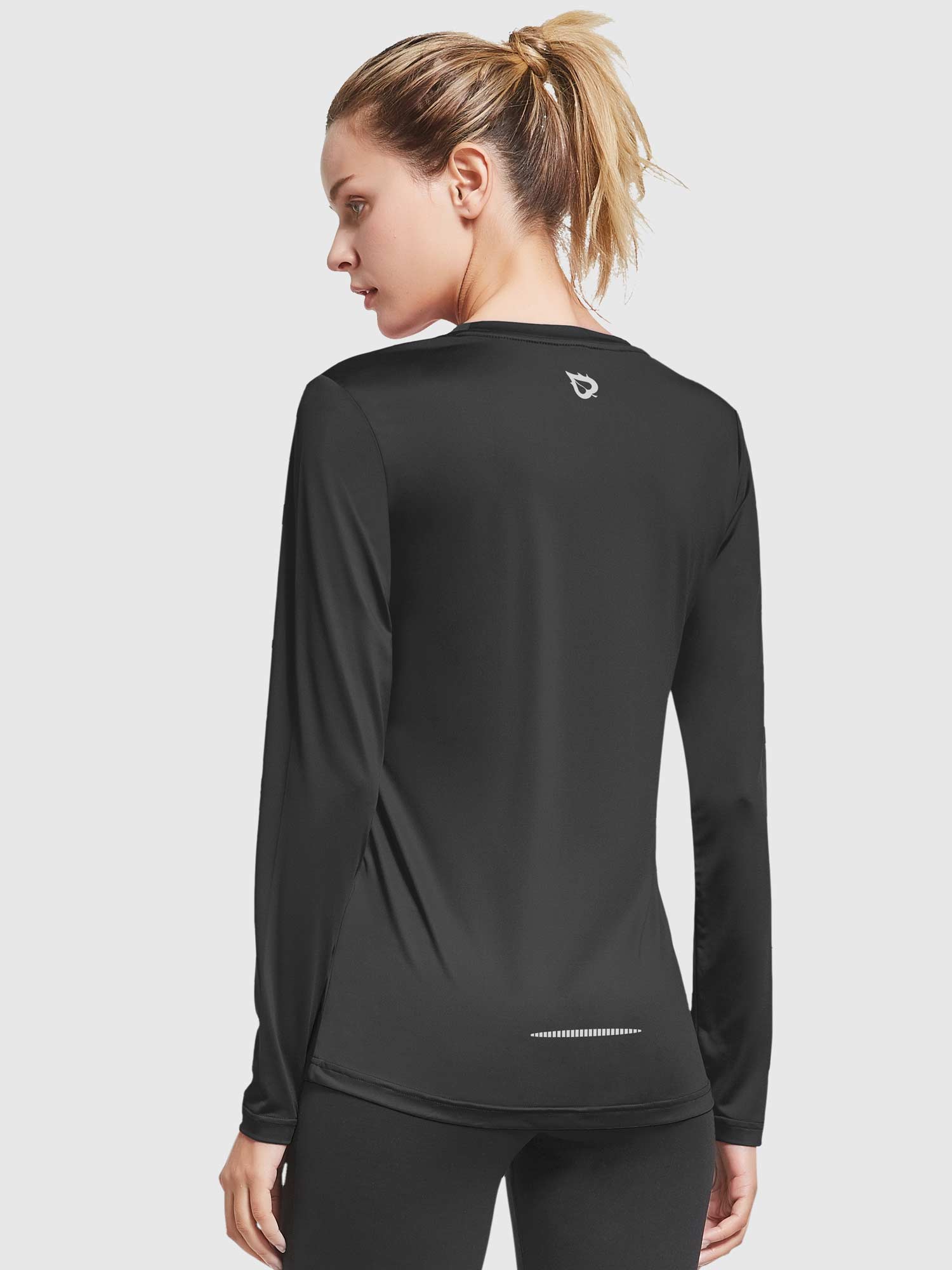 Move-Freely Set: Black long-sleeve running shirt with silver logo and reflective detail. #color_Black
