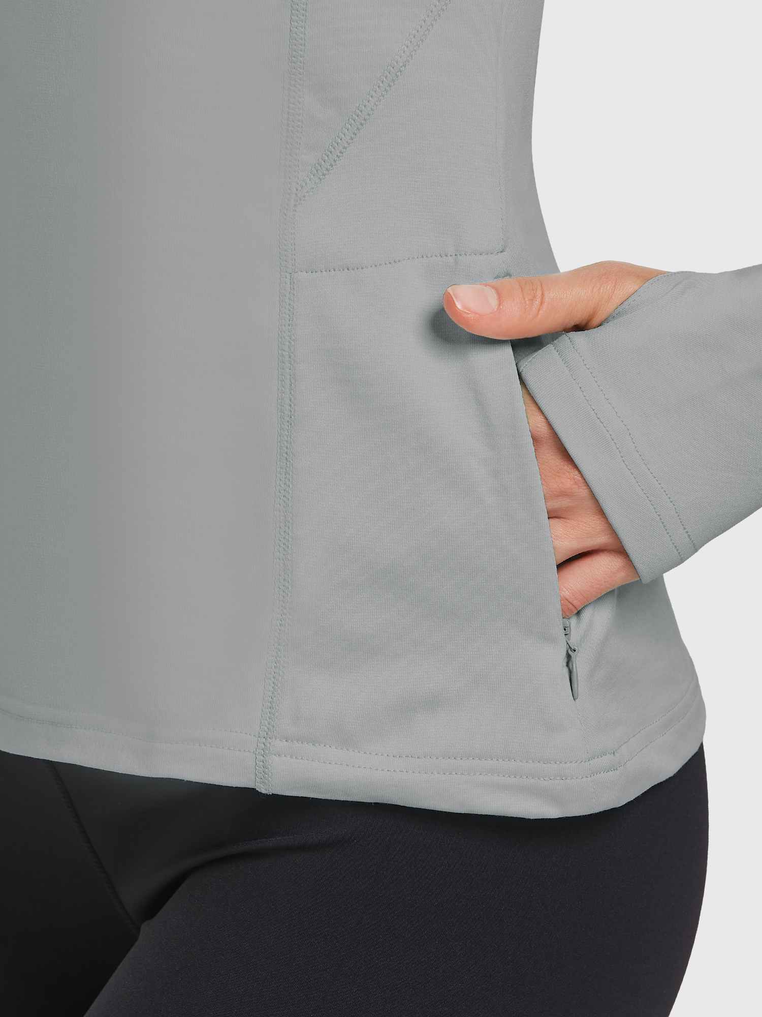 Grey fleece crew pullover with secure zip pocket and thumbhole cuff. #color_Light Gray