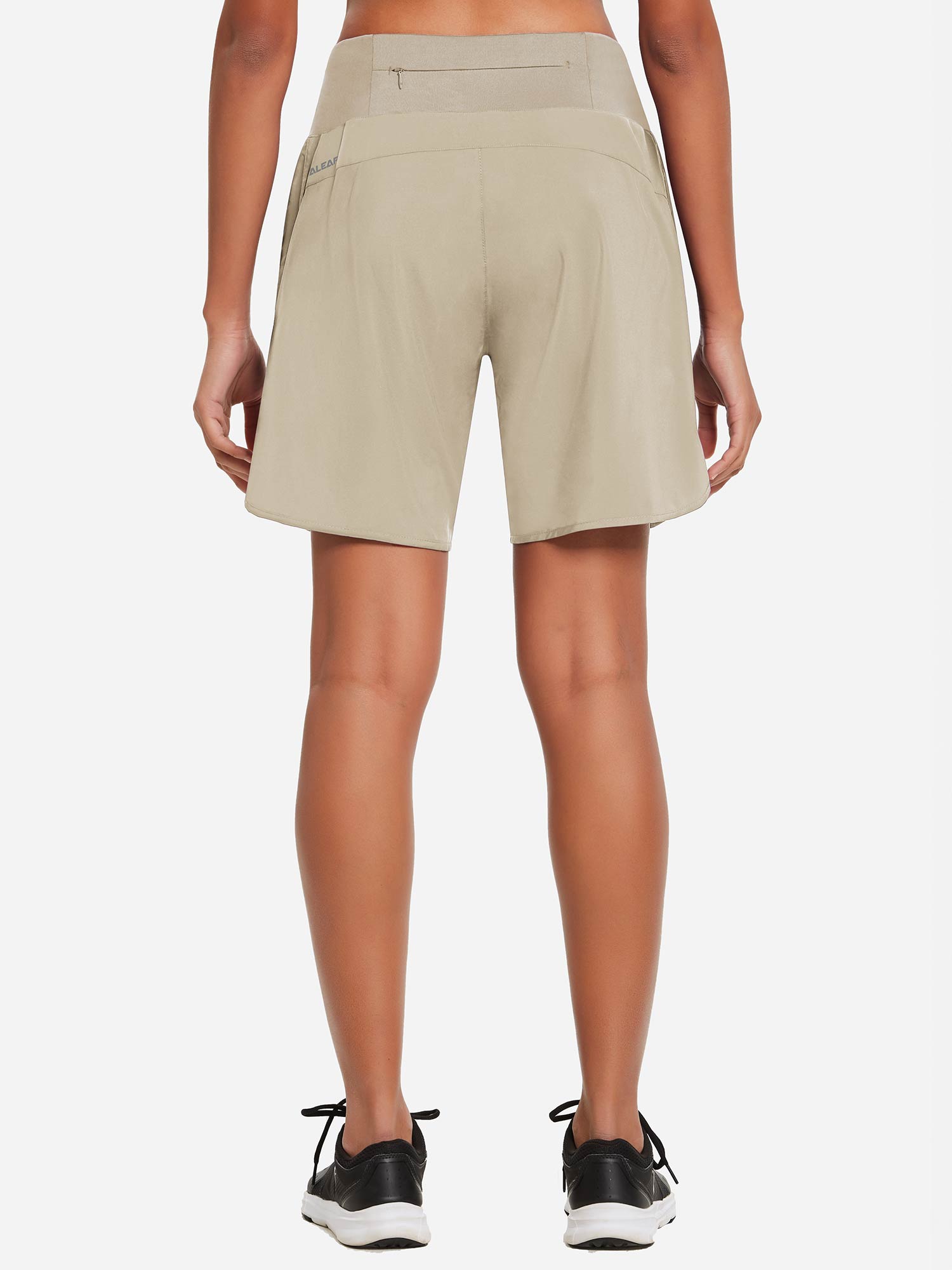 ALEAF women's 7-inch khaki running shorts, high-rise A-line fit, back view. #color_Khaki