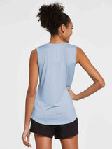 Light blue women's loose fit sleeveless workout tank top by Bakeit Sports, back view. #color_Kentucky Blue