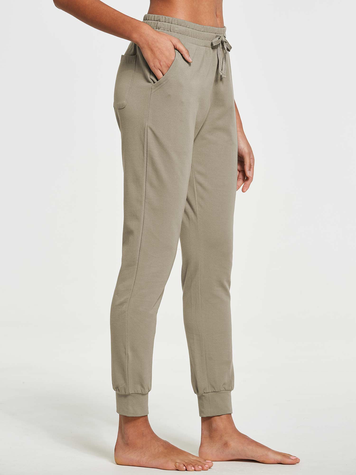 Women's tapered cotton sweatpants in taupe, with drawstring waist and cuffed ankles. #color_Khaki