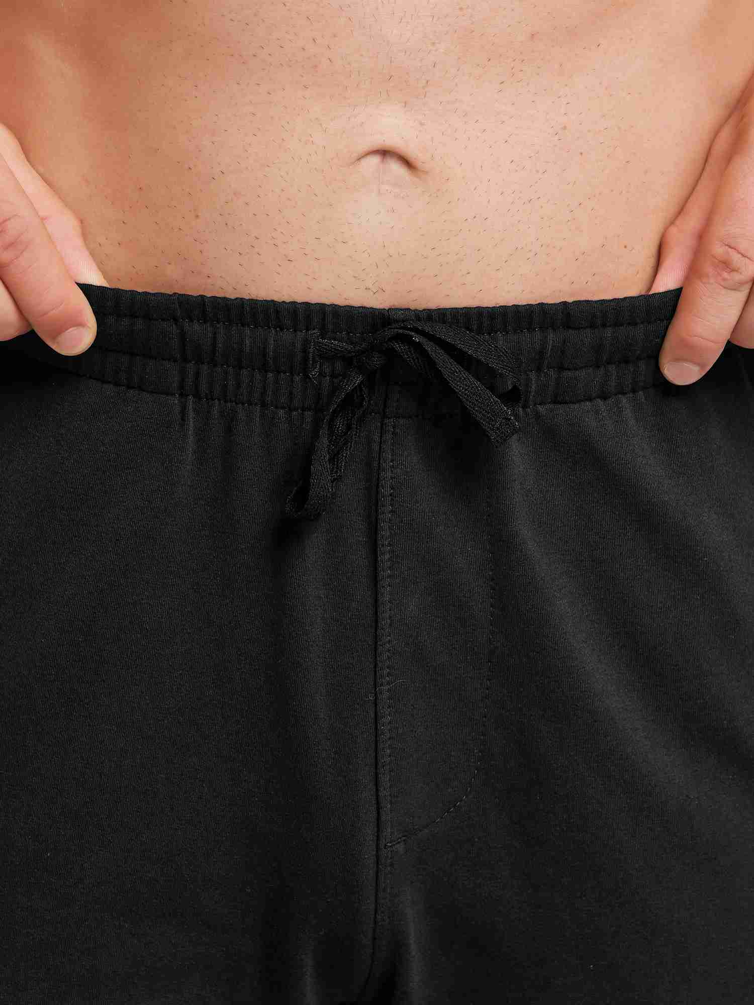 Men's black cotton straight-leg lounge pants with drawstring waist. #color_Black