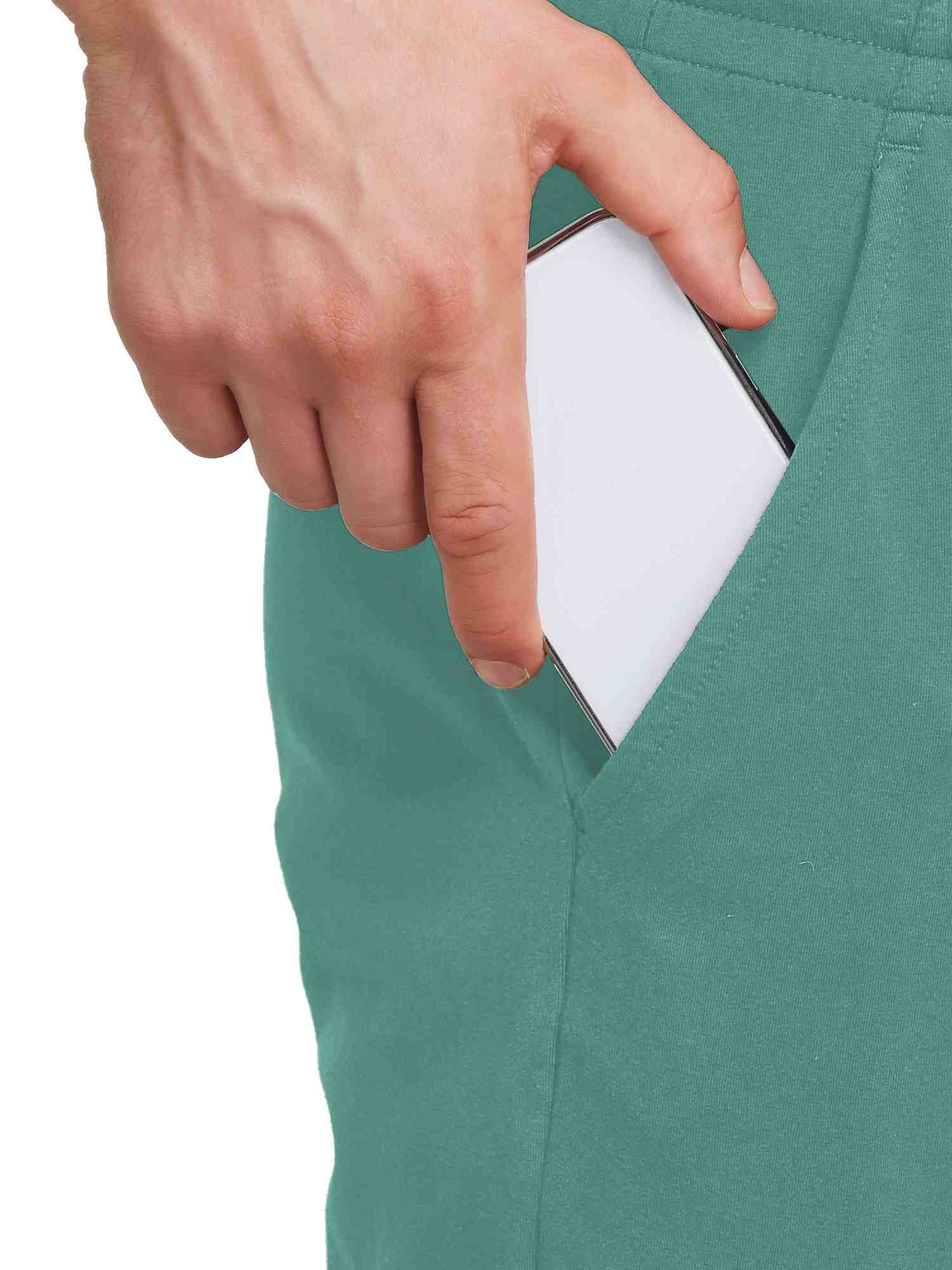 Men's teal cotton lounge pants with deep front pockets, one holding a smartphone. #color_Green