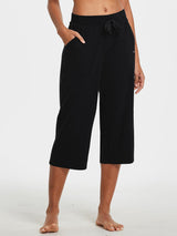 Black women's wide-leg cotton capri pants with drawstring waist and side pockets. #color_Black