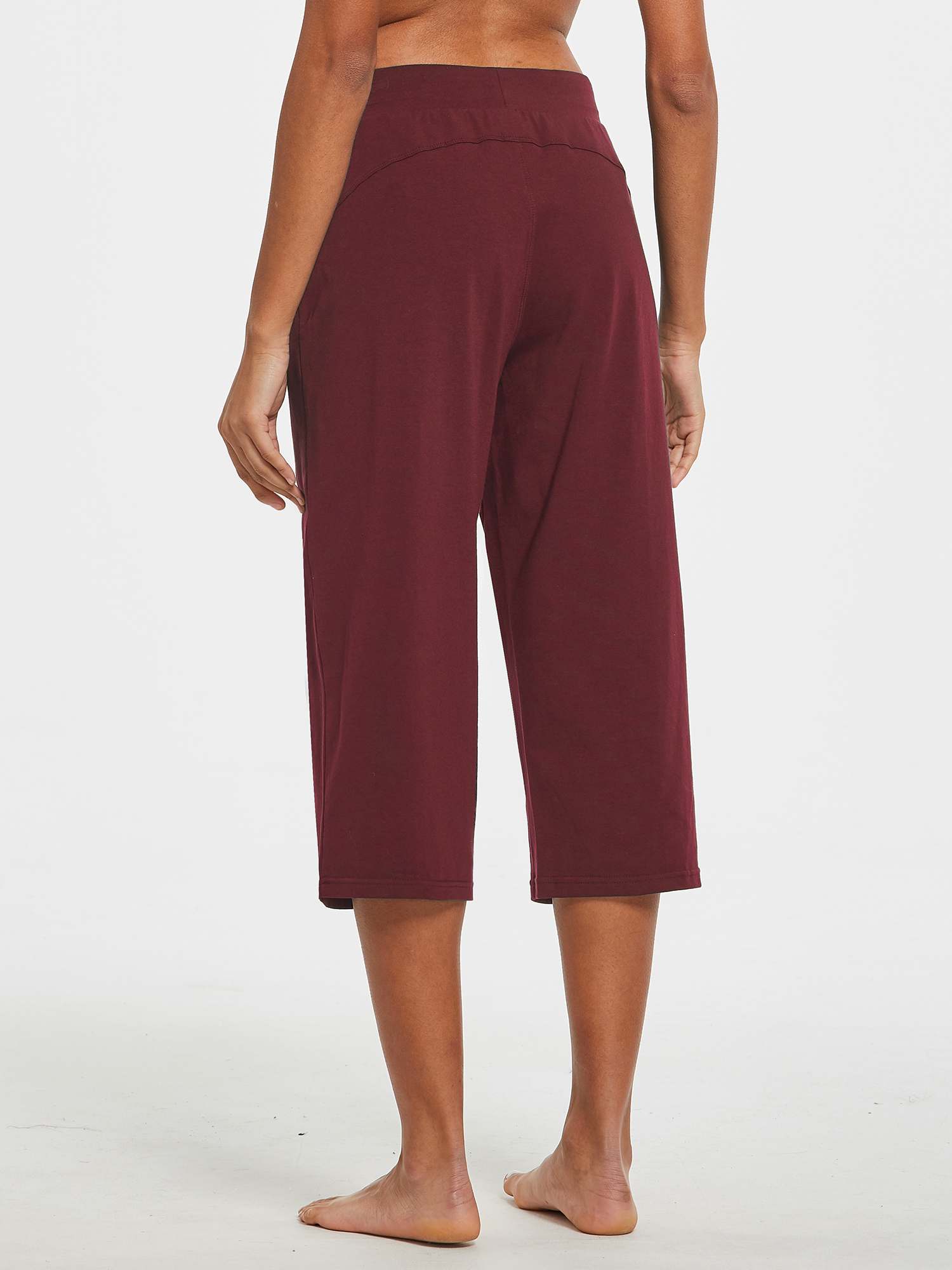 Women's wine red lightweight wide-leg cotton capri pants from behind. #color_Wine Red