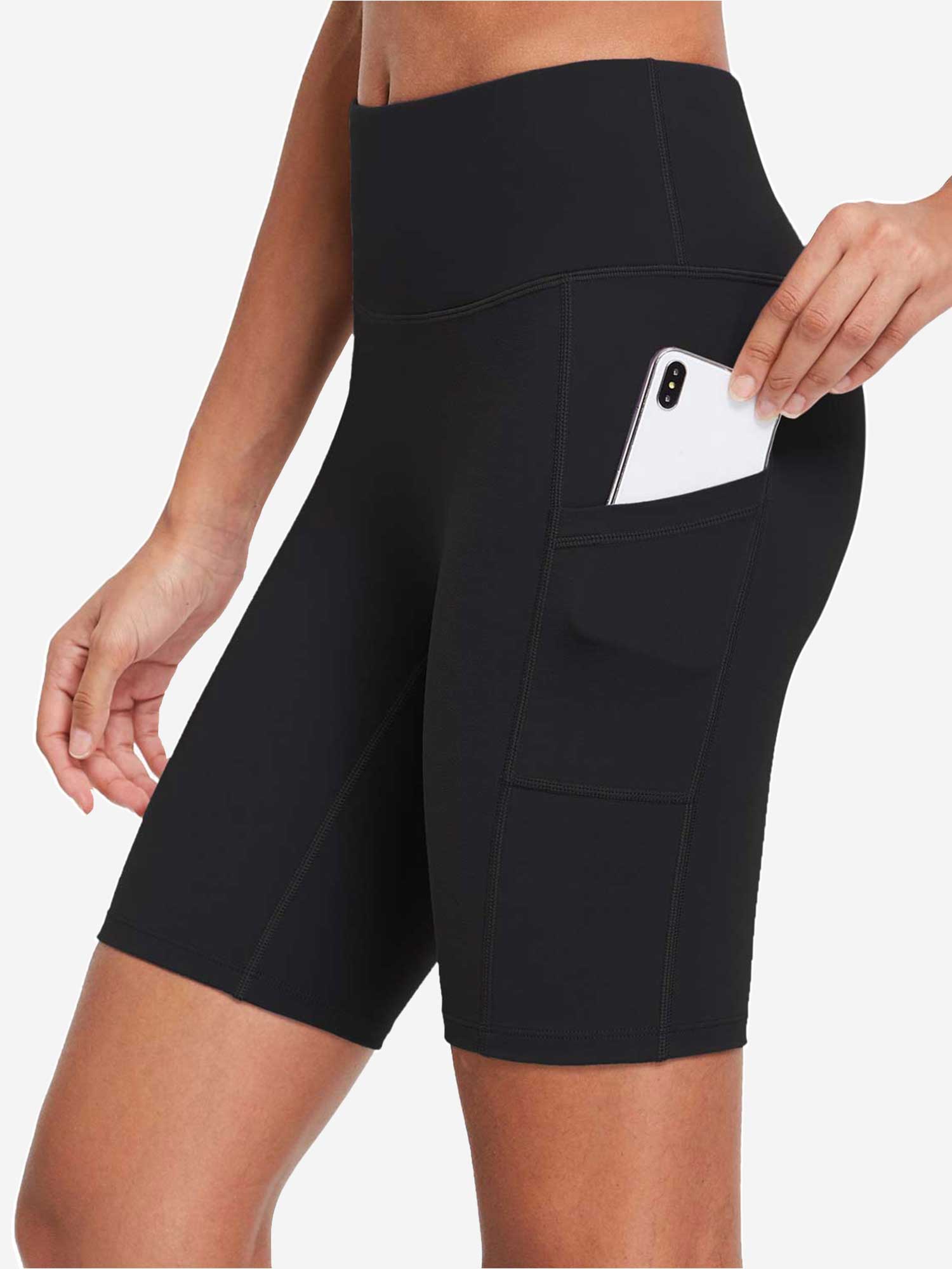 Black women's 8" high-waisted compression biker shorts with phone in side pocket. #color_Black