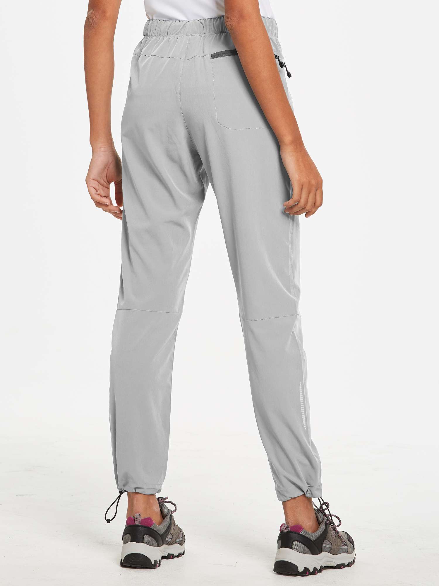 Grey Laureate UPF50+ DWR hiking pants with drawstring ankles for outdoor wear. #color_Light Gray