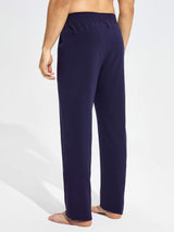 Men's navy blue cotton yoga cargo pants with loose fit and elastic waistband for comfort and flexibility. #color_Navy Blue