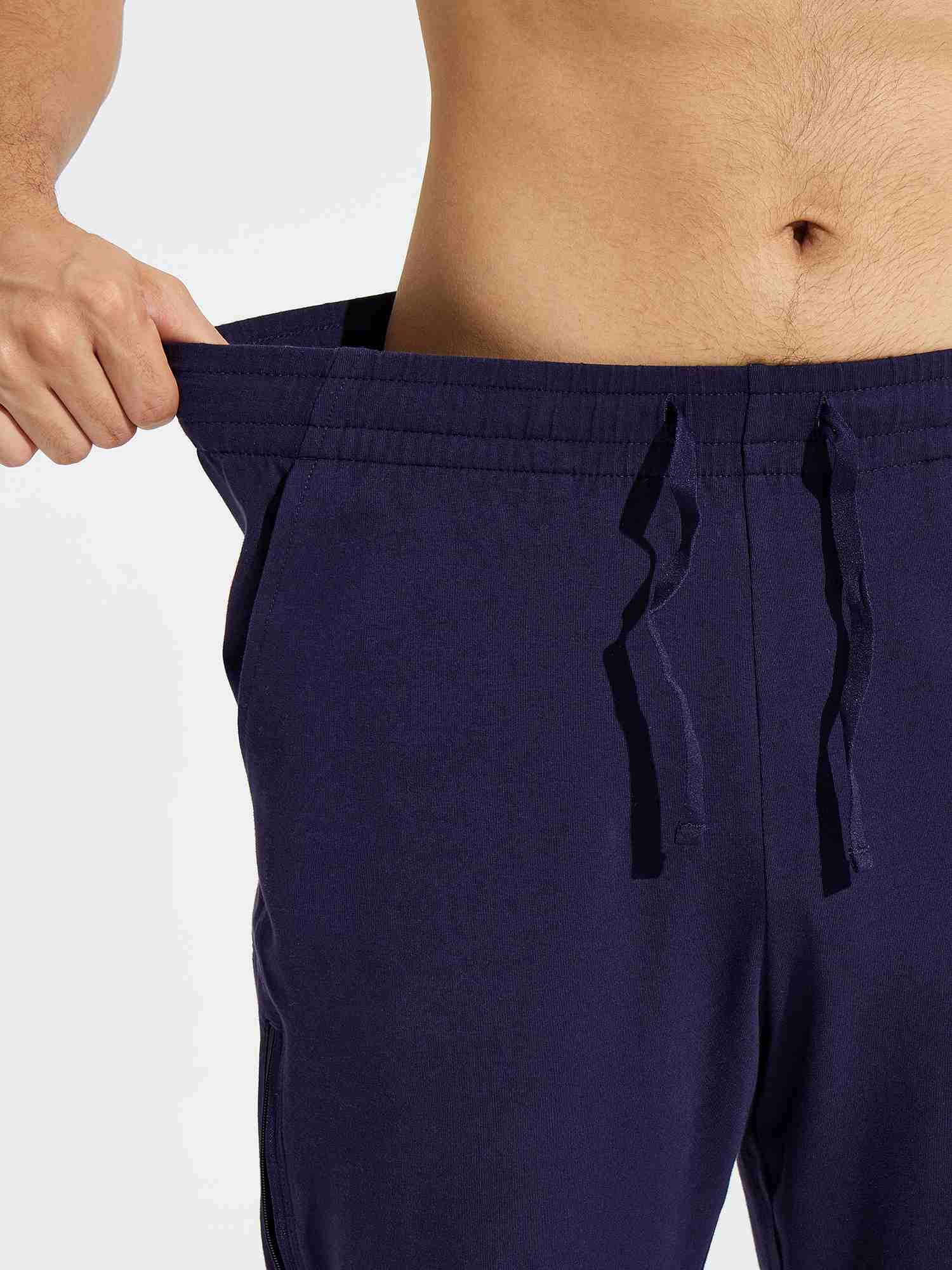 Men's navy blue cotton yoga cargo pants with adjustable drawstring and deep pockets. #color_Navy Blue