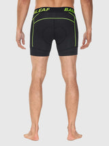 Men's black 4D cycling underwear with 6" inseam, anti-slip leg grips, and lime green accents. #color_Fluorescent Green
