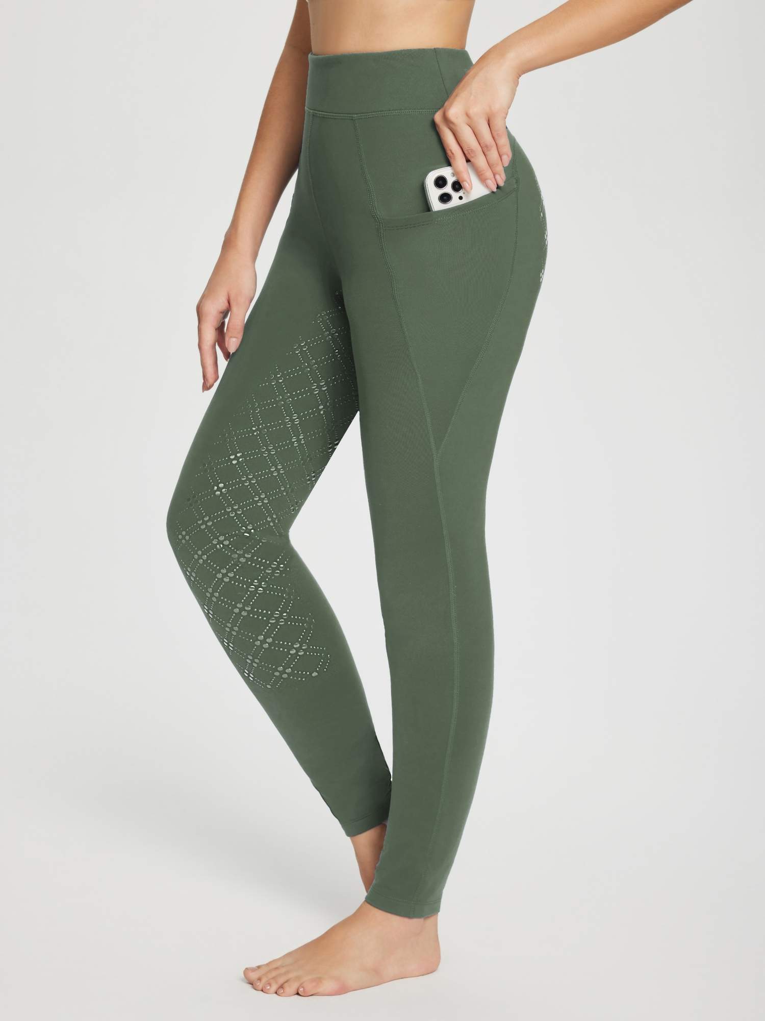 Women's olive green equestrian breeches with perforated legs and a phone pocket. #color_Army Green