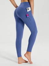 Blue fleece-lined cycling leggings for women, featuring phone pocket, zippered pocket, and contoured fit. #color_Navy Blue