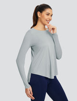 Light gray crew neck long sleeve t-shirt for women with a loose fit and hip-length coverage.