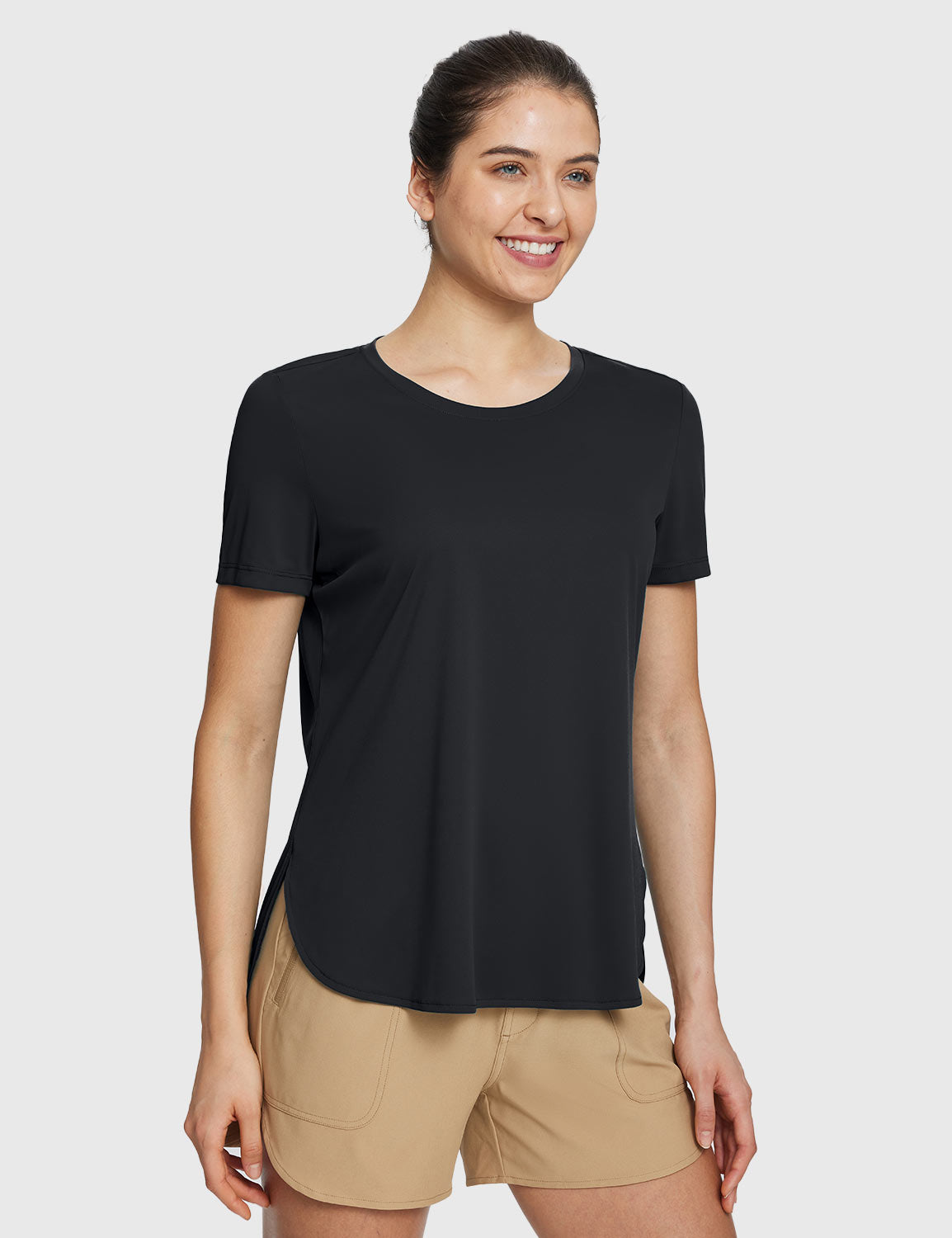 Black UPF 50+ short sleeve tee and tan DWR shorts for casual trail. #color_Black