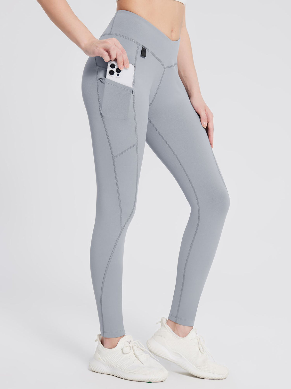 Grey fleece-lined multi-pocket hiking leggings with phone in side pocket #color_Gray