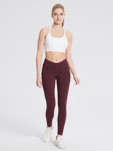 Fleece-lined burgundy hiking leggings with V-waist and zippered side pockets. #color_Wine Red