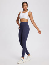 Women's navy high-rise knit fleece leggings with zippered side pocket.