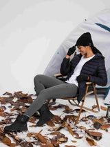 Grey high-rise knit fleece leggings with pockets worn by woman in snowy scene #color_Lavender Gray