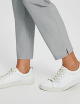 Grey Baleaf UPF 50+ active pants with ankle slit and white sneakers #color_Light Grey