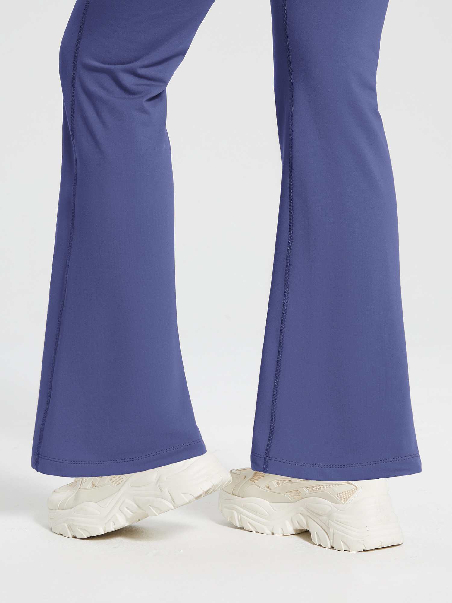 Blue fleece-lined drawstring high-waist flare pants with bootcut. #color_Navy Blue