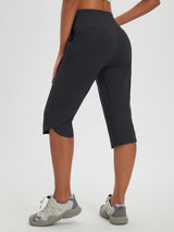 Women's dark grey 17-inch capri pants with scalloped hem for cycling and hiking. #color_Black