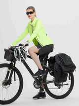 Casual black 14" cycling capris on woman with touring bike
