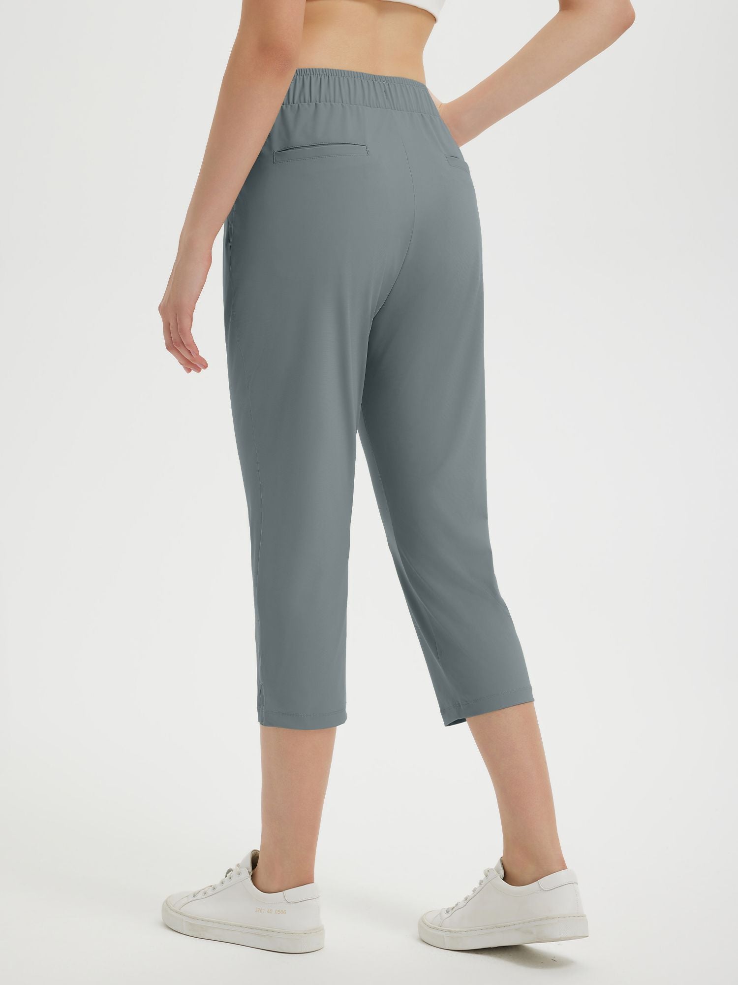 Grey women's 20-inch high-waisted cropped golf pants with elastic waist #color_Dark Gray