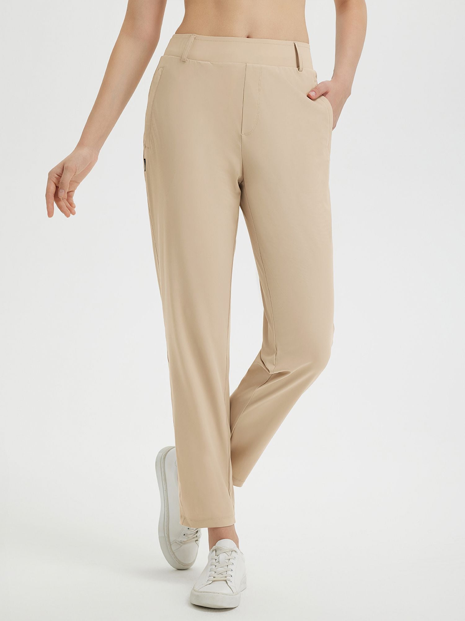 Women's light beige 27-inch golf pants with a comfortable, stretchy fit. #color_Khaki