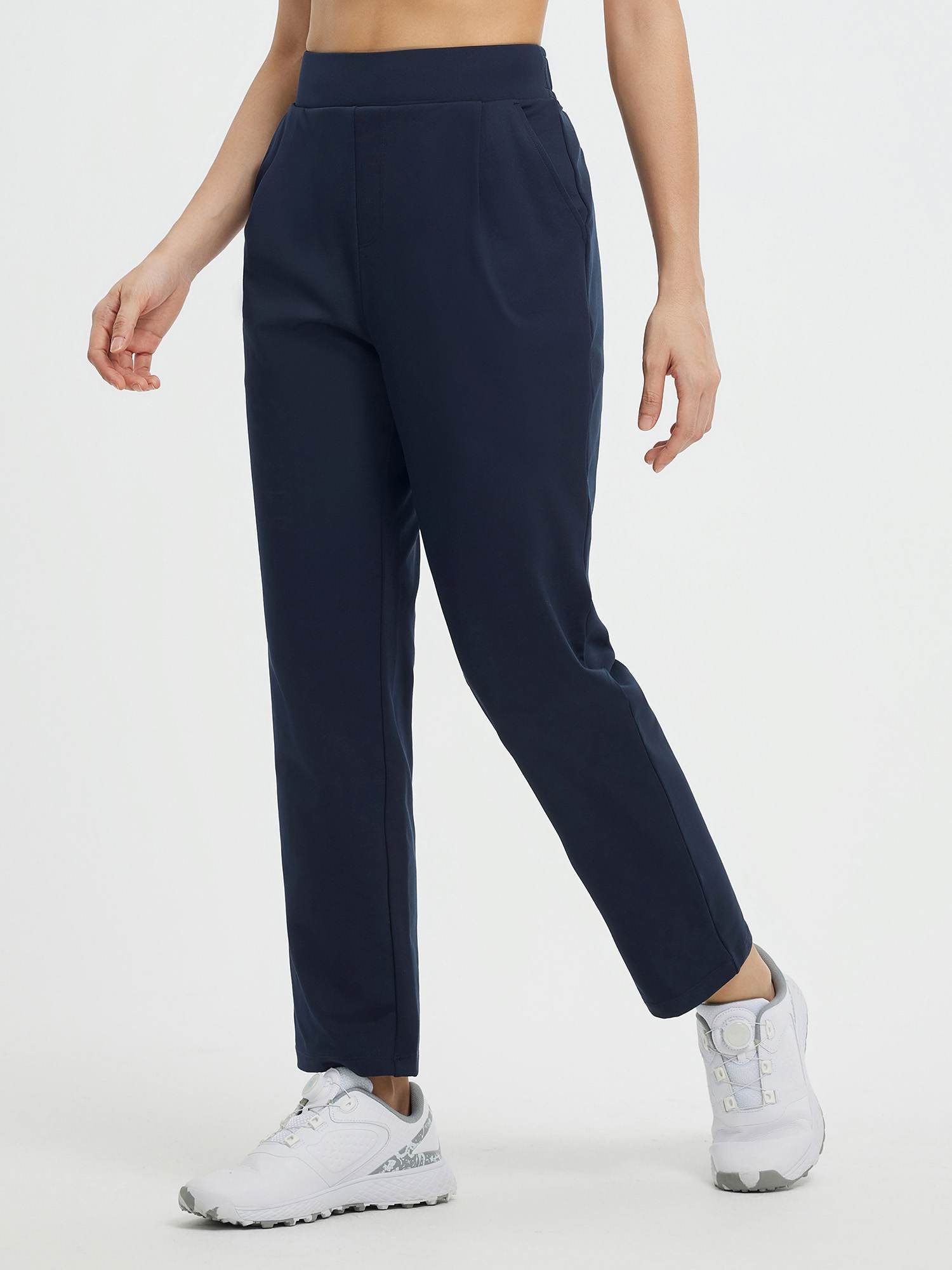 Navy pleated fleece slim-fit golf pants with drawstring waistband and front pleat. #color_Navy Blue