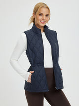 Navy quilted golf vest with adjustable drawstring waist and zip pockets. #color_Navy Blue