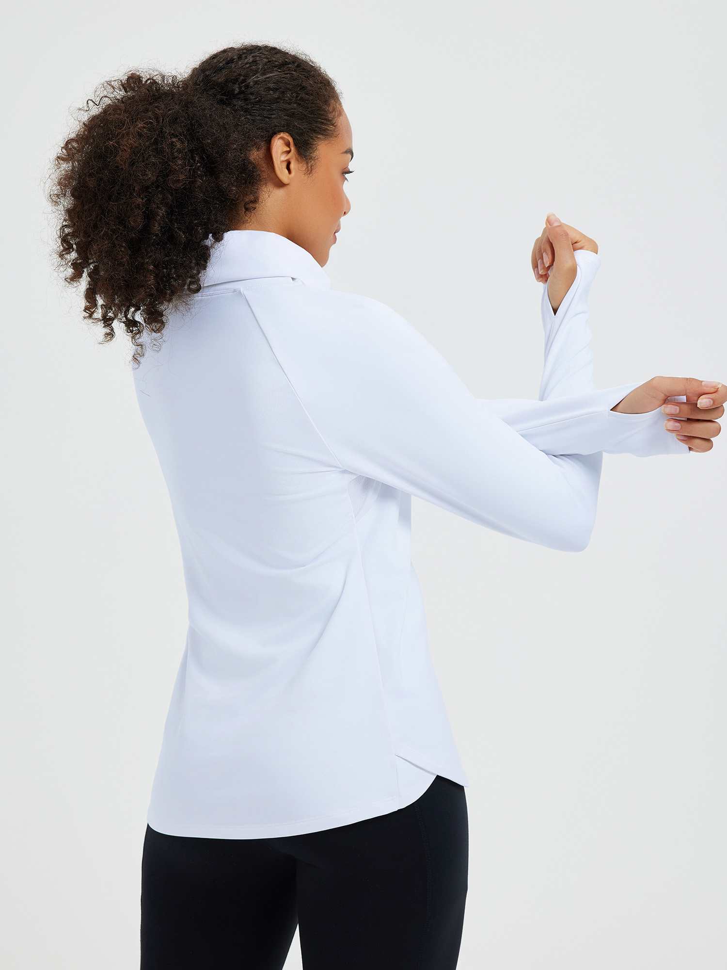 White ski fleece base layer with thumbholes and convertible protective collar. #color_White