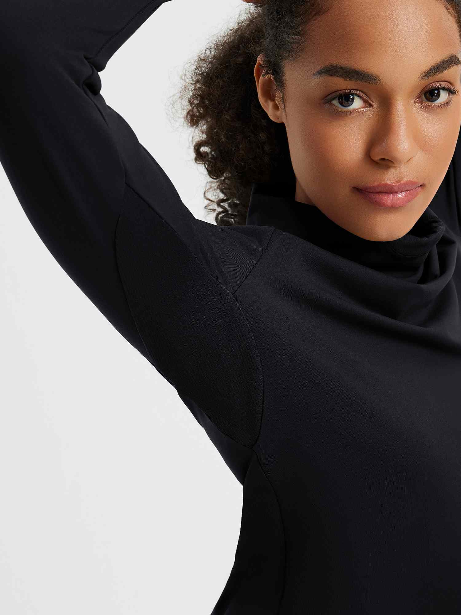 Black ski fleece base layer with protective hood