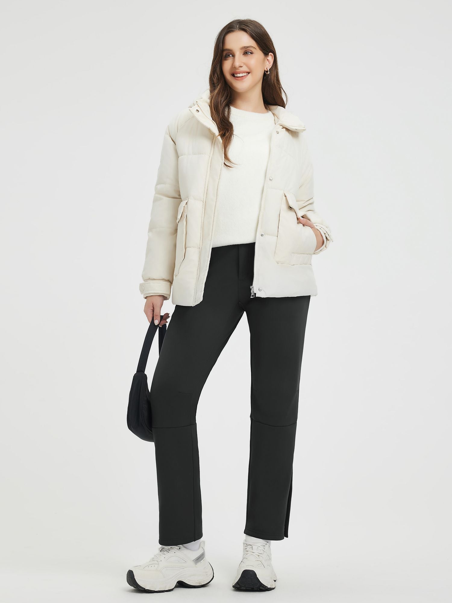 Woman modeling black knit heavyweight fleece straight ski pants #color_Black
