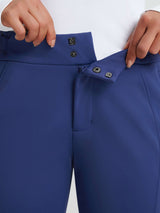 Women's navy ski softshell pants high-rise waistband closure detail. #color_Navy Blue