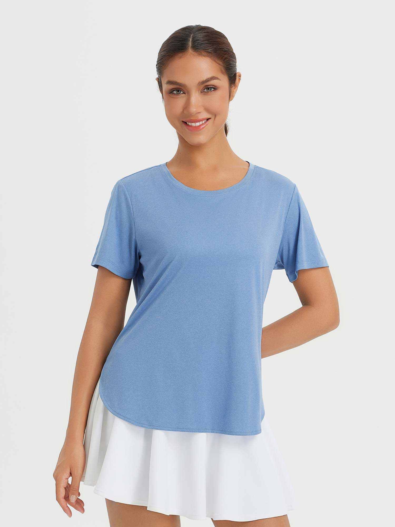 Blue women's outdoor short sleeve crew neck t-shirt with white skirt. Lightweight, breathable, UPF 50+ sun protection.