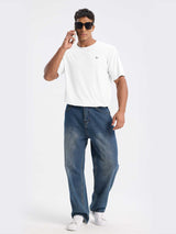 Men's white outdoor short sleeve crew neck t-shirt with UV protection, shown on a model wearing blue jeans. #color_White
