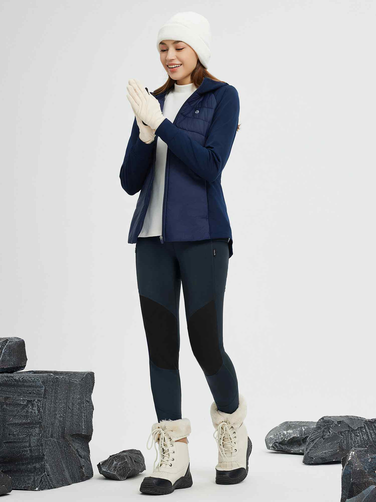 Outdoor slim-fit knit fleece pants with black knee panels and zipper pockets.