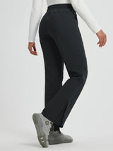 Women's outdoor softshell straight-leg zipper pocket pants with snap closures. #color_Black