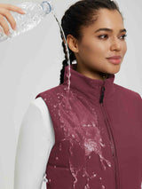 Burgundy quilted Dupont insulated vest demonstrating water repellency. #color_Wine Red