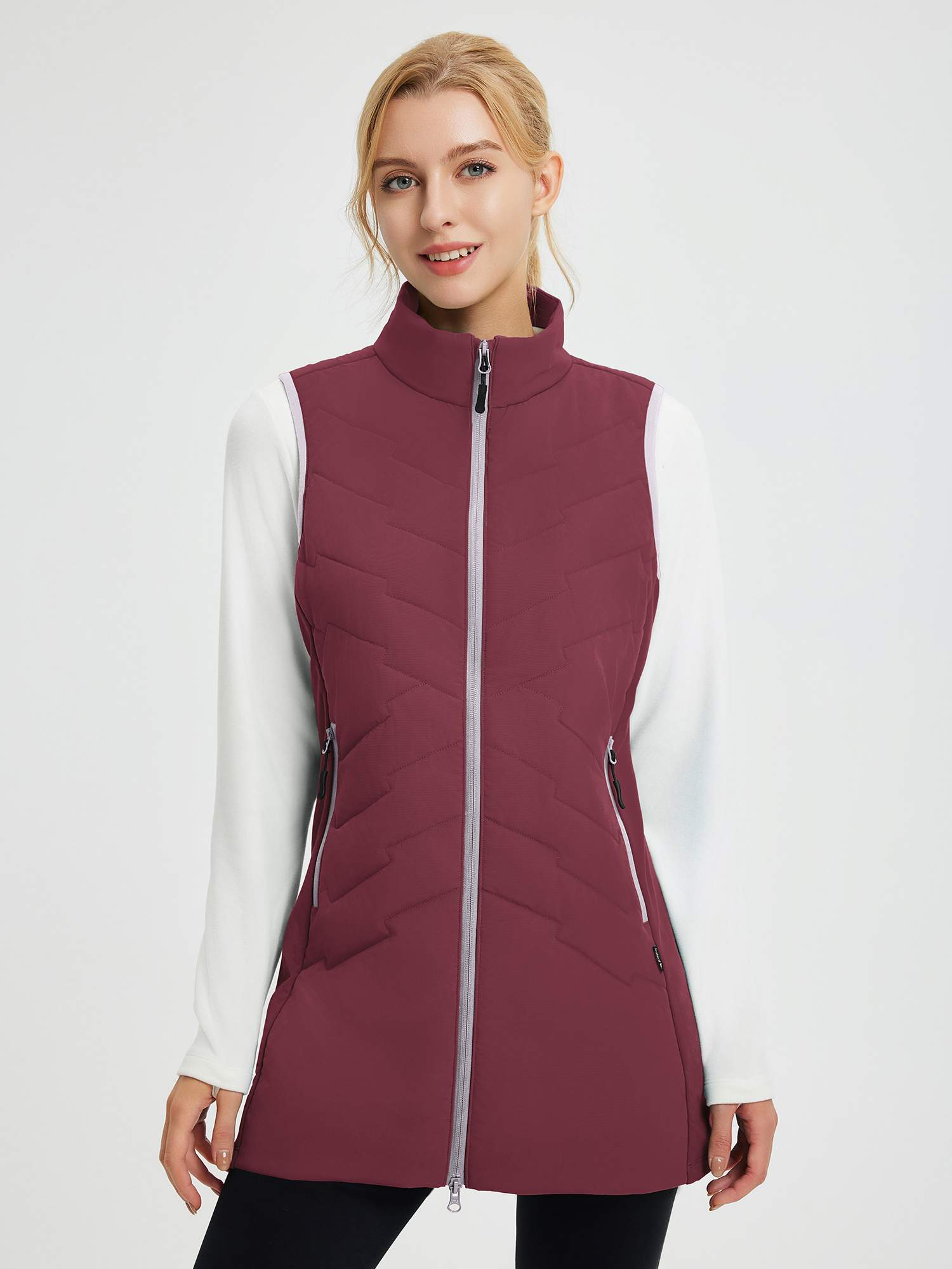 Women's burgundy quilted mid-length outdoor hiking vest with zipper pockets. #color_Wine Red