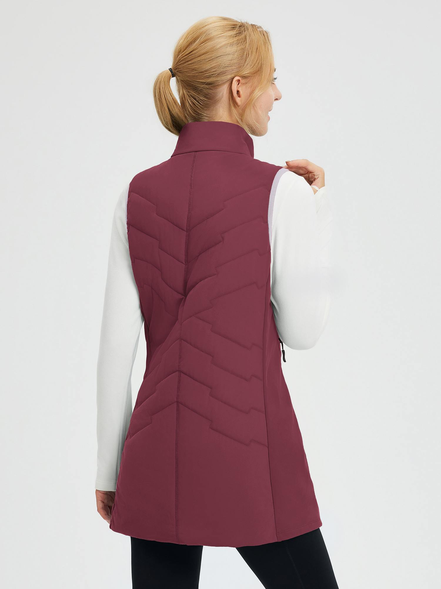 Women's outdoor mid-length quilted burgundy hiking vest, back view. #color_Wine Red