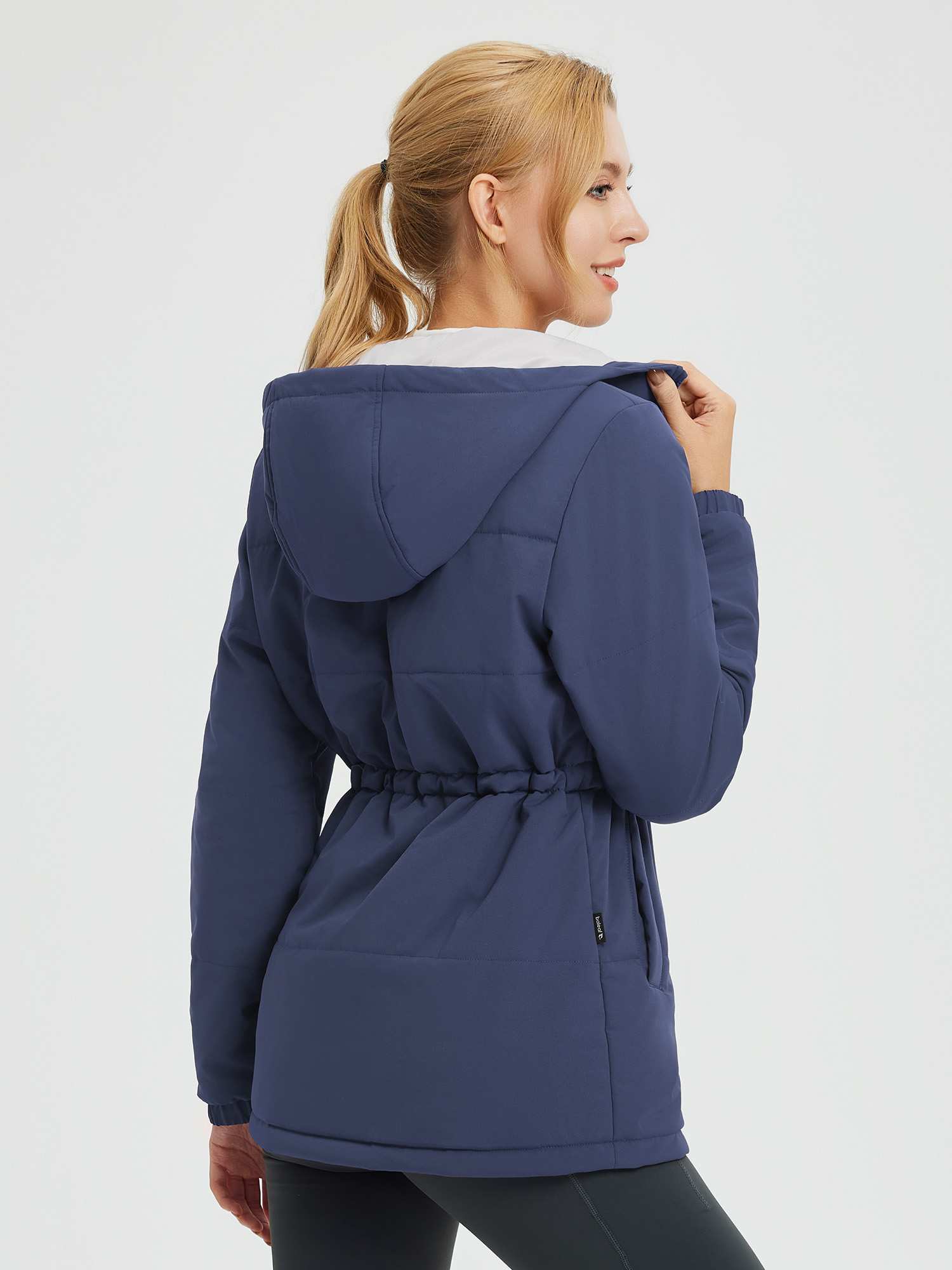 Navy blue water-resistant hooded women's cinch waist puffer jacket. #color_Navy Blue